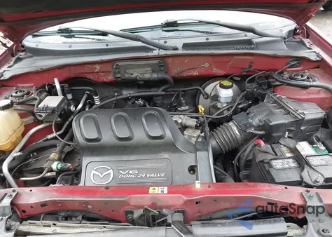 2004 Mazda Tribute Es V6 z USA, uszkodzony, nr VIN 4F2CZ06144KM01743